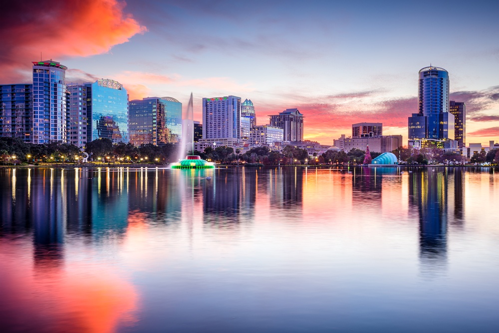 Orlando, Florida, USA skyline at Eola Lake.